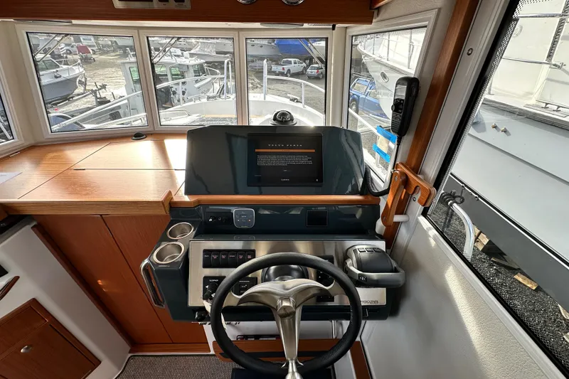 Slide: The Image of Interior helm of 2023 Sargo 28 boat with modern controls and navigation system. - 22