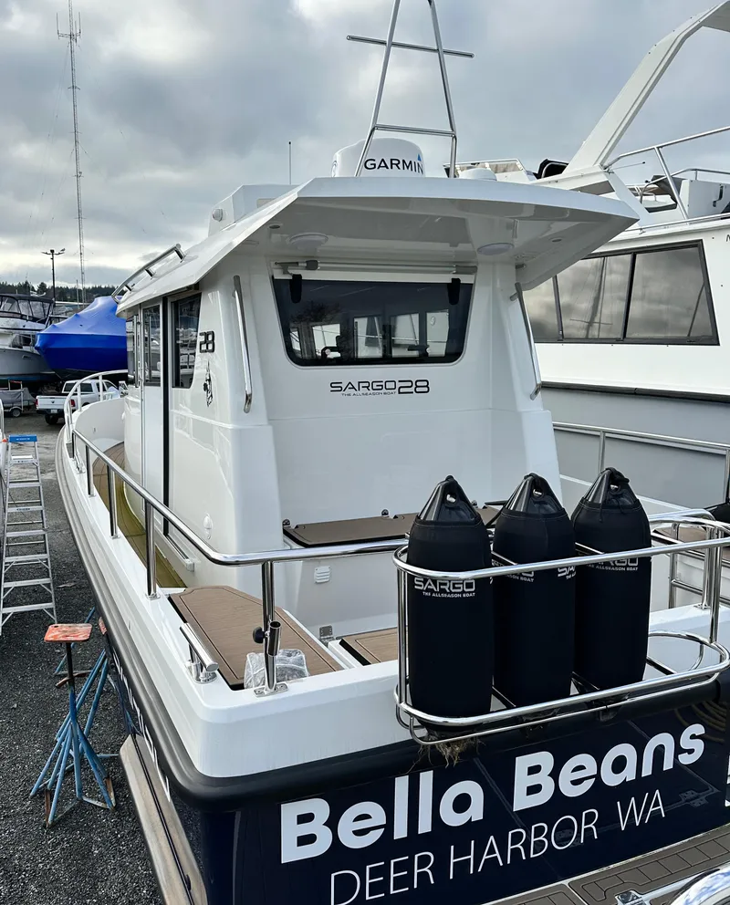 Slide: The Image of 2023 Sargo 28 boat docked at Deer Harbor, WA, named "Bella Beans." - 5