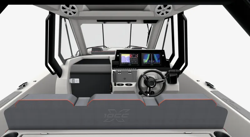 Slide: The Image of Interior of 2025 Zodiac X10CC boat with modern dashboard and steering wheel. - 6