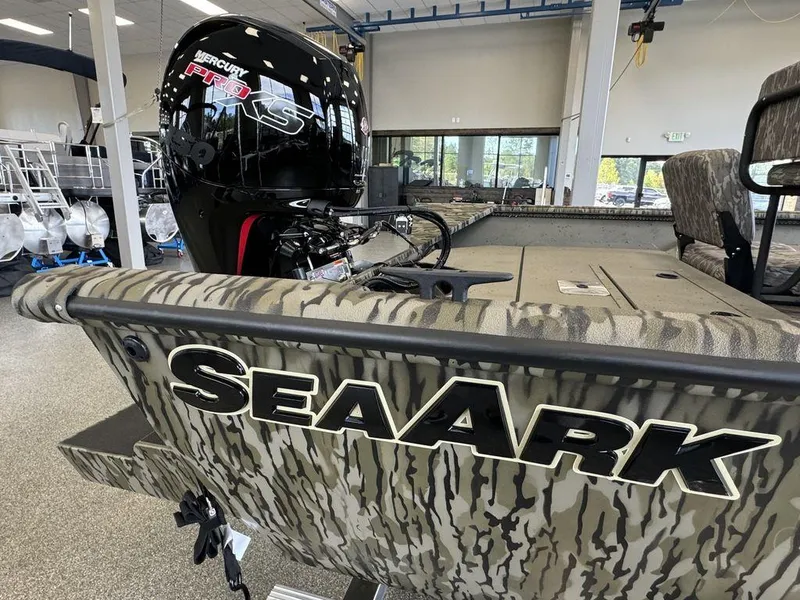Slide: The Image of 2025 SeaArk Shadow 20 Elite CC boat with camo design and Mercury Pro XS engine. - 17