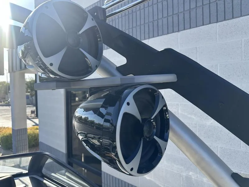 Slide: The Image of 2020 Malibu 23 LSV boat speakers mounted on a sleek metal frame. - 15