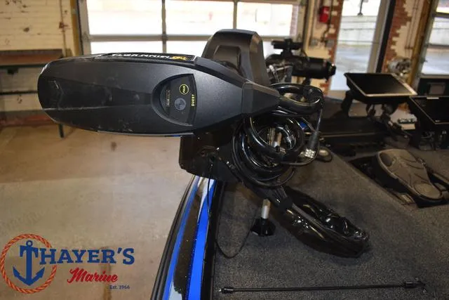 Slide: The Image of 2024 Nitro Z21 XL boat interior with steering wheel and seating. - 12