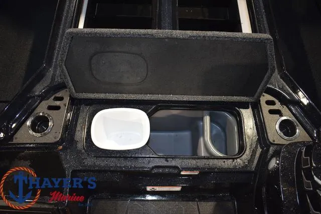 Slide: The Image of 2024 Nitro Z21 XL boat battery compartment with orange batteries and wiring. - 14