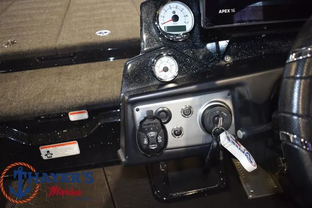 Slide: The Image of 2024 Nitro Z21 XL boat interior with storage compartments and motor. - 16