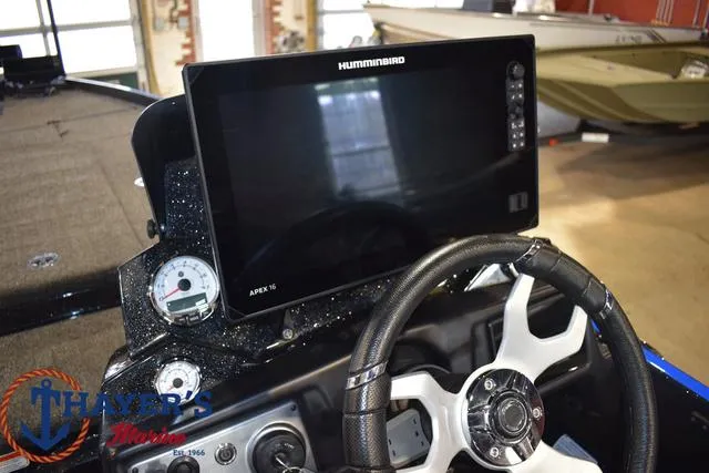 Slide: The Image of 2024 Nitro Z21 XL boat storage compartment with cup holder. - 18