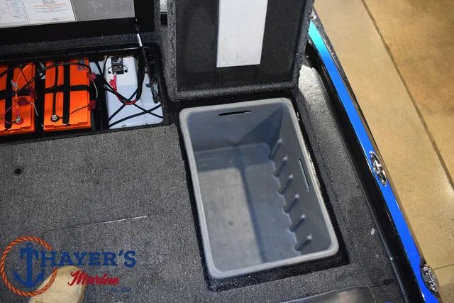 Slide: The Image of 2024 Nitro Z21 XL fishing rod storage compartment with multiple rods. - 21