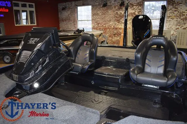 Slide: The Image of 2024 Nitro Z21 XL boat interior with dual seats at Thayer's Marine showroom. - 44