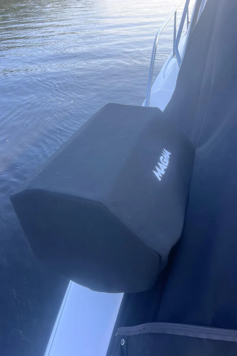 Slide: The Image of 2000 Sea Ray 460 Sundancer yacht docked in a serene marina setting. - 11