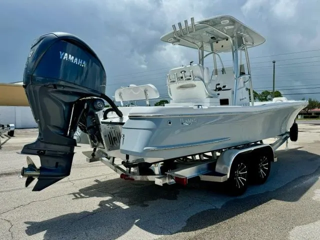 Slide: The Image of 2025 BlackJack 256 Coastal boat with Yamaha engine on trailer. - 4