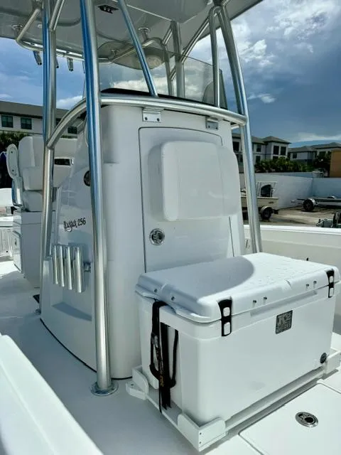 Slide: The Image of 2025 BlackJack 256 Coastal boat interior with seating and storage. - 8
