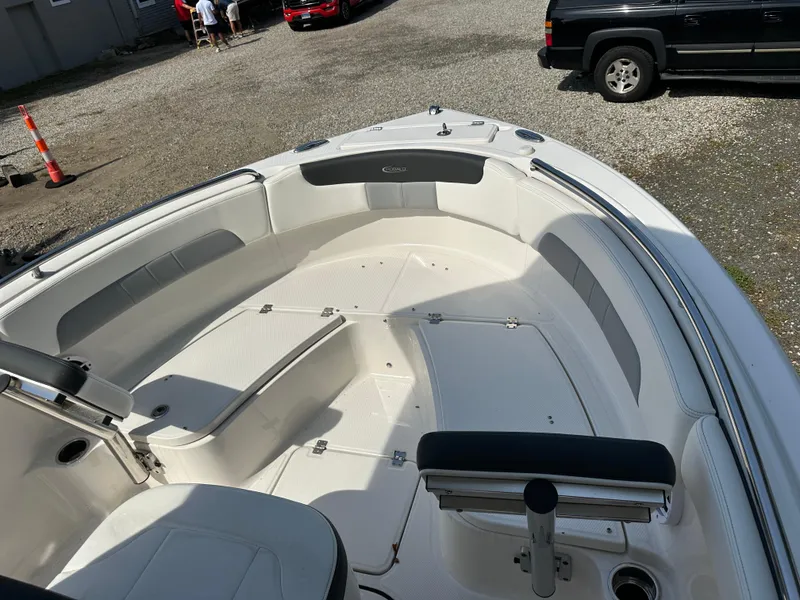 Slide: The Image of 2025 Robalo R222 Explorer boat interior with seating and storage compartments. - 5