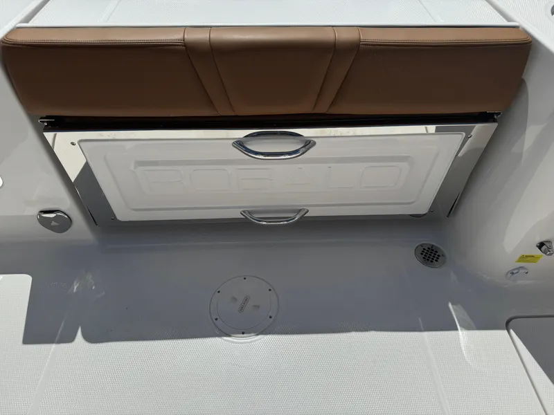 Slide: The Image of 2025 Robalo R250 Center Console boat seat with storage compartment. - 14