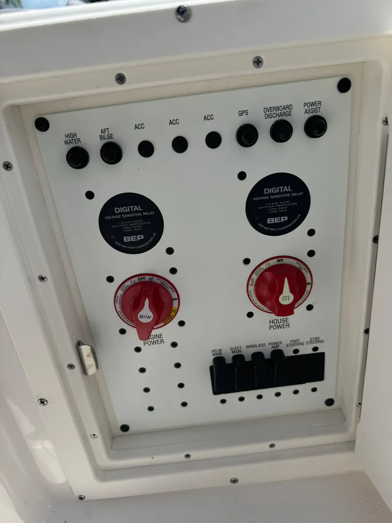 Slide: The Image of Control panel of 2025 Robalo R250 Center Console boat with digital displays and switches. - 18