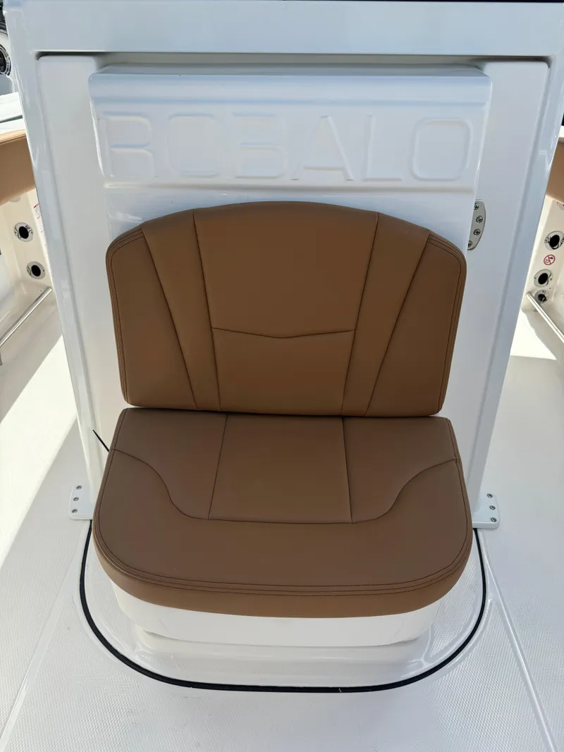 Slide: The Image of 2025 Robalo R250 Center Console seat with tan upholstery. - 23