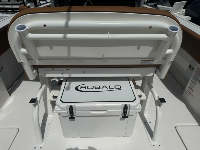 Slide: The Image of 2025 Robalo R250 Center Console boat with integrated cooler and seating. - 5
