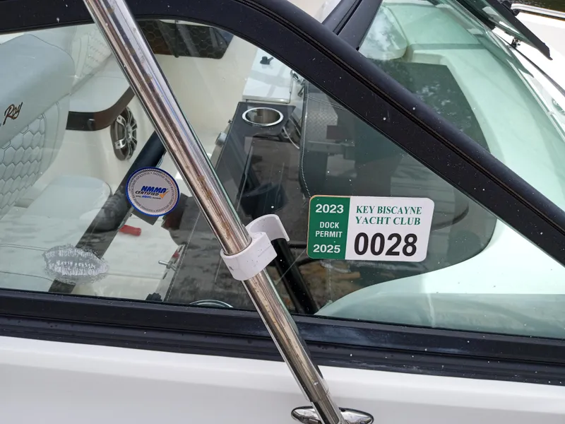 Slide: The Image of 2022 Sea Ray SDX 250 Outboard with Key Biscayne Yacht Club permit sticker. - 16