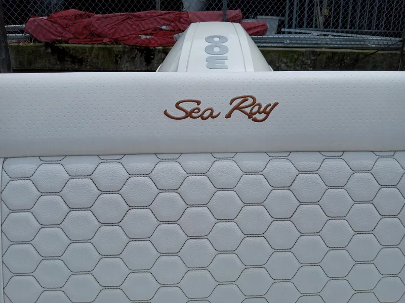 Slide: The Image of 2022 Sea Ray SDX 250 Outboard boat seat with hexagonal pattern and logo. - 30