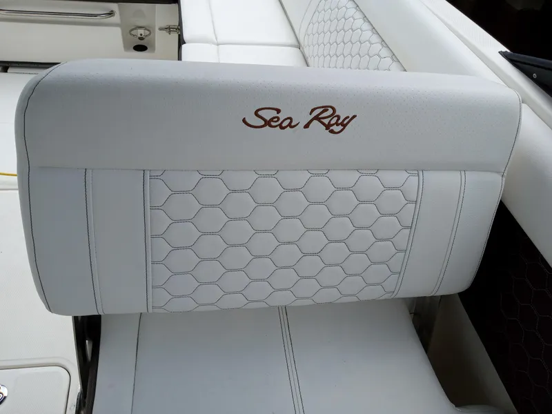 Slide: The Image of 2022 Sea Ray SDX 250 Outboard boat seat with hexagonal pattern and logo. - 34