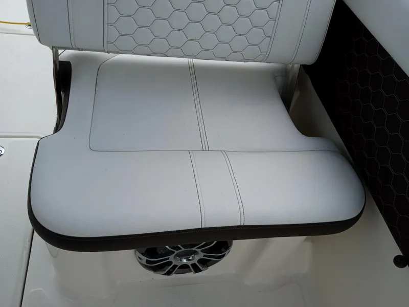 Slide: The Image of White leather seat with hexagonal stitching in 2022 Sea Ray SDX 250 Outboard. - 35
