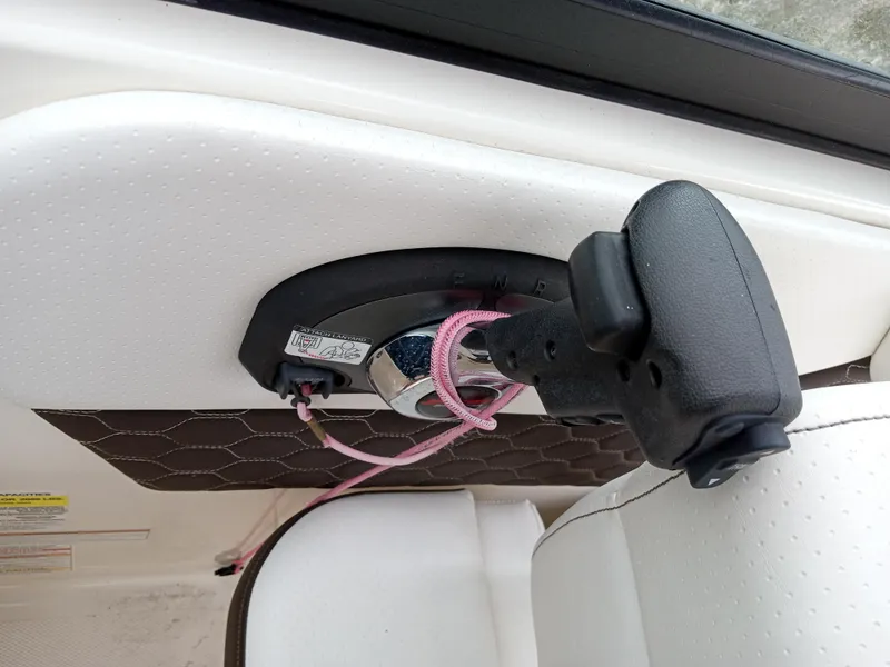 Slide: The Image of Close-up of 2022 Sea Ray SDX 250 Outboard boat throttle control. - 5