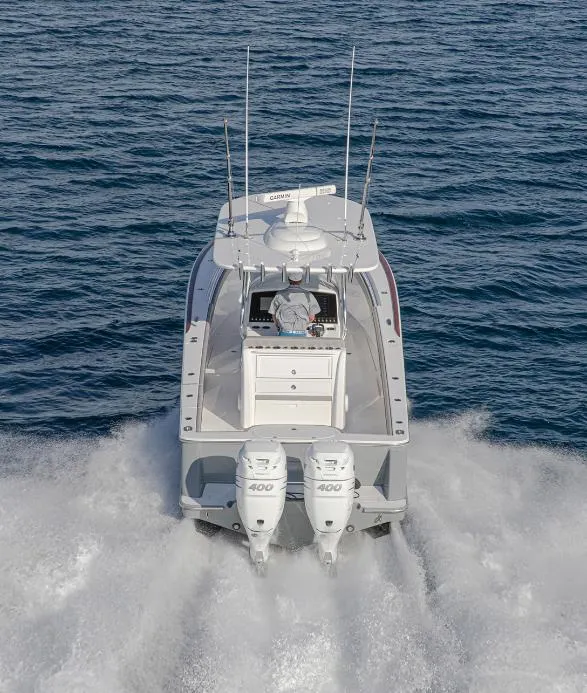 Slide: The Image of 2025 Valhalla Boatworks 33 cruising on open water, rear view. - 3