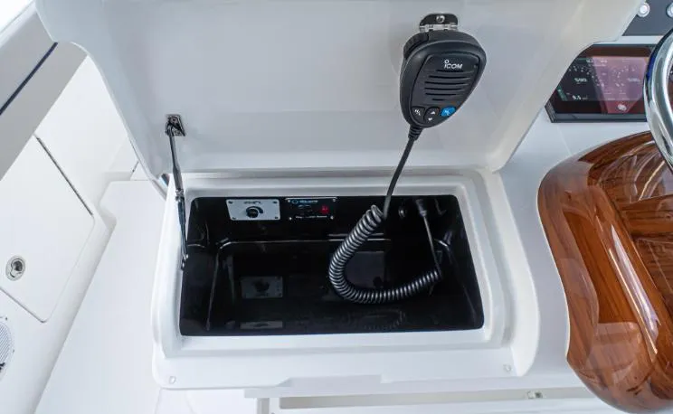 Slide: The Image of 2025 Valhalla Boatworks 33 communication system with microphone and control panel. - 6
