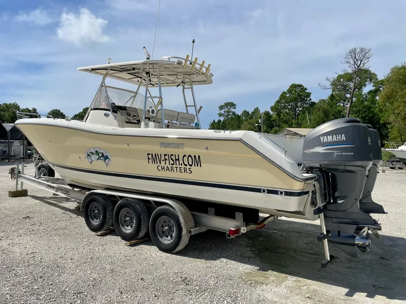 Slide: The Image of 2006 Pursuit 3070 Center Console boat on trailer with Yamaha engines, FMV-Fish.com charters. - 4