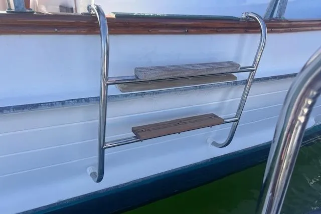 Slide: The Image of Stainless steel ladder on 1980 Grand Banks 32 Flybridge Trawler, Hull#683. - 37