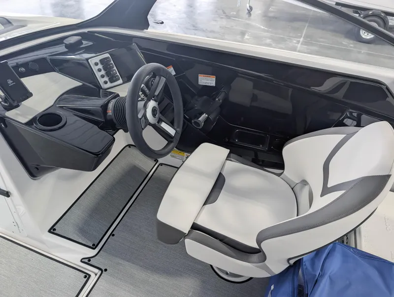 Slide: The Image of 2025 Yamaha Boats AR220 cockpit with modern steering and controls. - 8