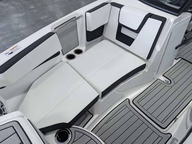Slide: The Image of 2025 Yamaha Boats 222SE interior seating with sleek design and modern upholstery. - 27