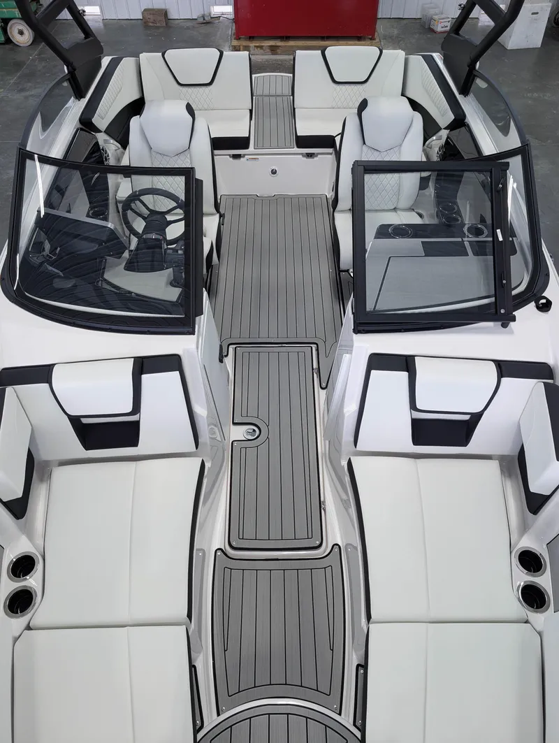 Slide: The Image of 2025 Yamaha Boats 222SE interior with sleek seating and modern design. - 29