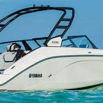 Slide: The Image of 2025 Yamaha Boats 222SD on clear blue water, showcasing sleek design and modern features. - 9