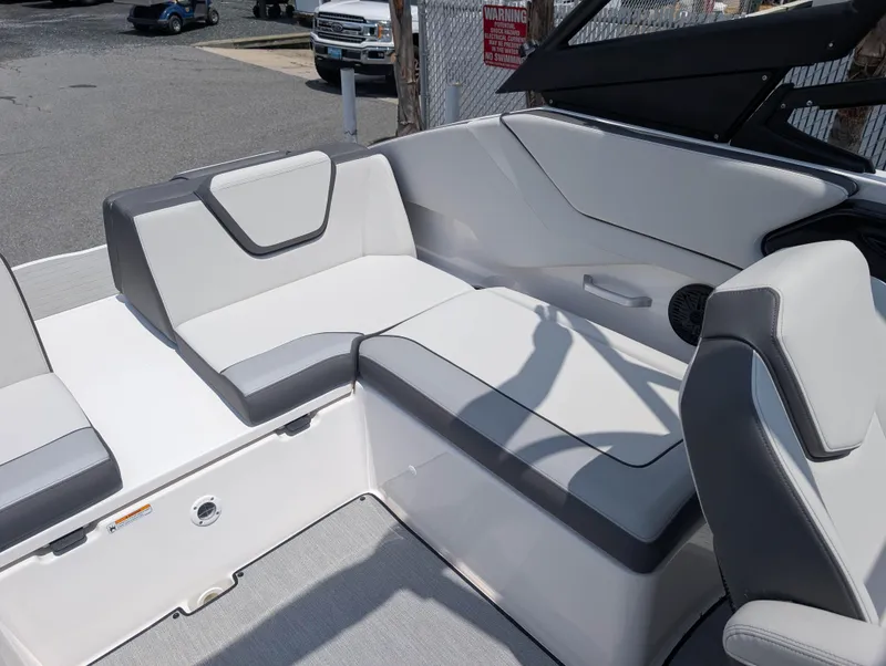 Slide: The Image of 2025 Yamaha Boats AR250 interior with sleek, modern seating design. - 10