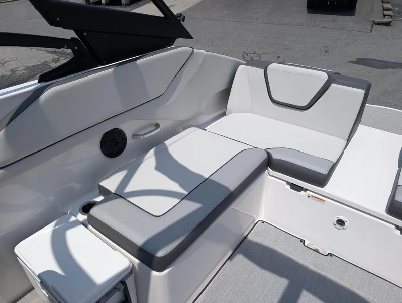 Slide: The Image of 2025 Yamaha AR250 boat interior with sleek gray seating and modern design. - 9