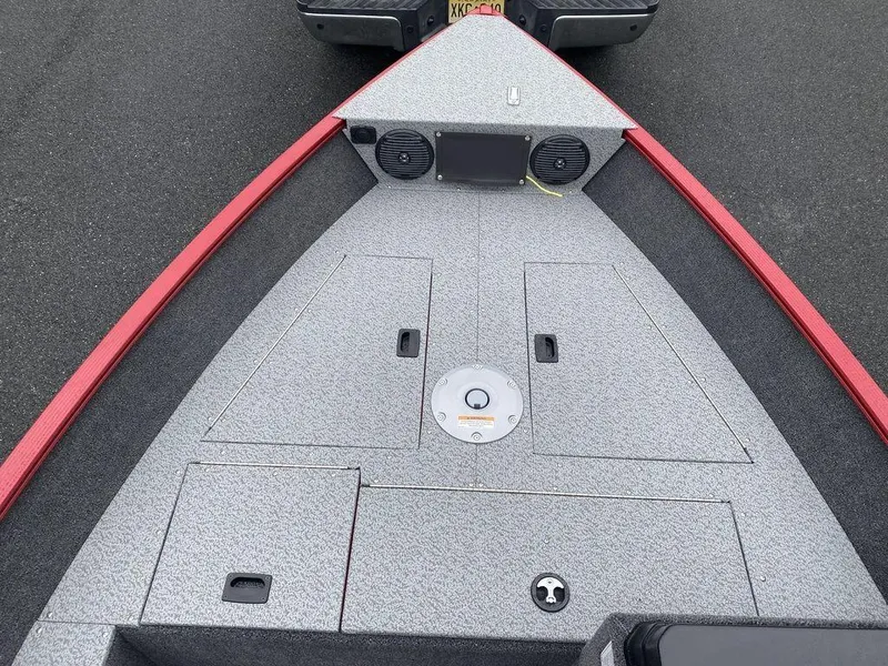 Slide: The Image of 2025 Lund 1650 Angler boat deck with storage compartments and speakers. - 6