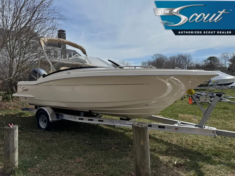 The Image of 2025 Scout 215 Dorado boat on trailer at authorized dealer. - 0