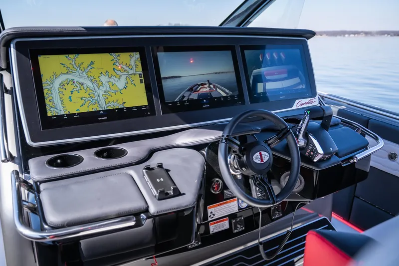 Slide: The Image of 2025 Cigarette 41 Nighthawk dashboard with advanced navigation screens and controls. - 15