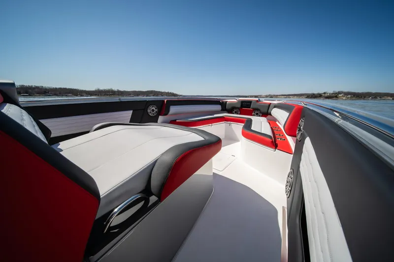 Slide: The Image of 2025 Cigarette 41 Nighthawk boat interior with sleek red and white seating. - 24