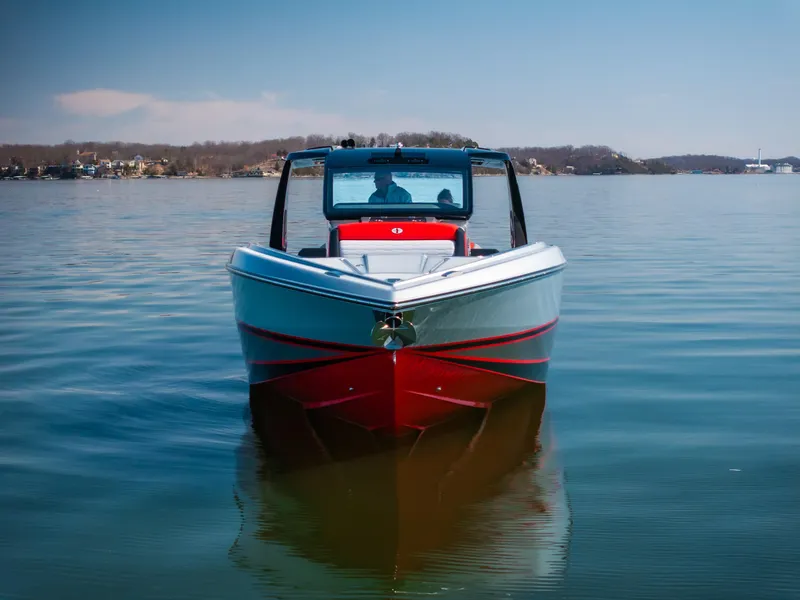 Slide: The Image of 2025 Cigarette 41 Nighthawk boat on calm water, front view. - 3