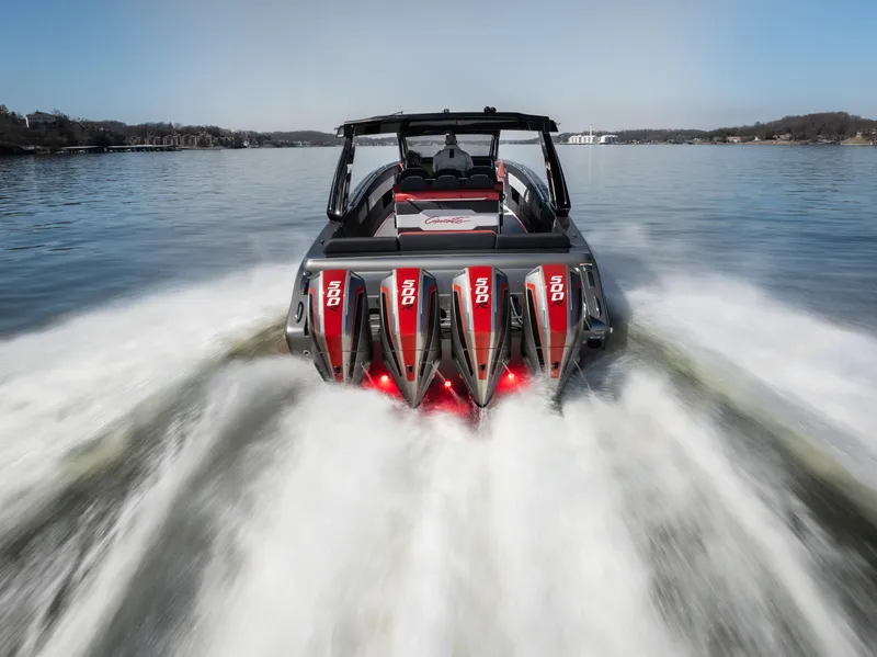 Slide: The Image of 2025 Cigarette 41 Nighthawk speedboat with powerful engines on a lake. - 5