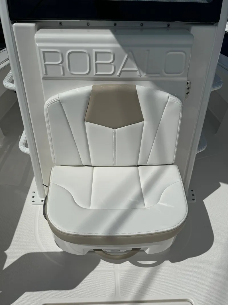 Slide: The Image of 2025 Robalo 266 Cayman SD boat seat with embossed logo. - 25
