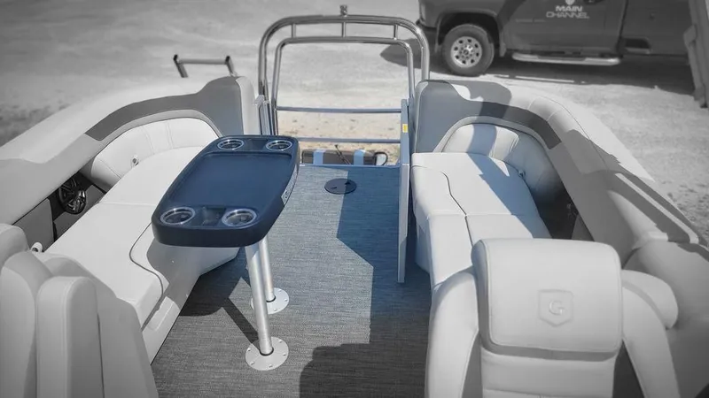 Slide: The Image of 2025 Godfrey SWEETWATER 2286 SB interior with seating and table. - 4