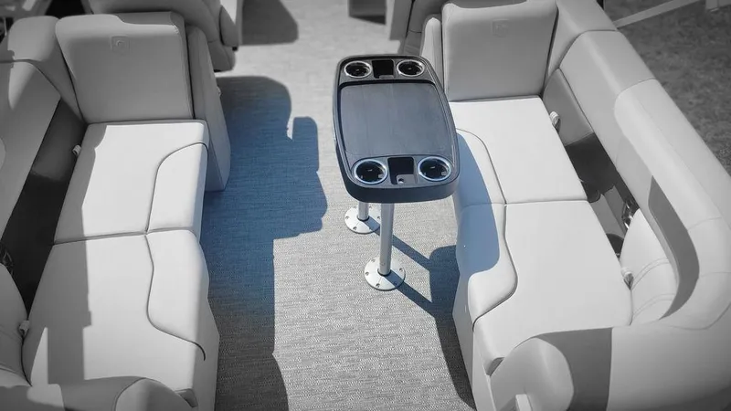 Slide: The Image of Interior of 2025 Godfrey SWEETWATER 2286 SB pontoon boat with seating and table. - 6