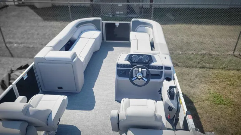 Slide: The Image of 2025 Godfrey SWEETWATER 2286 SB pontoon boat interior with seating and steering console. - 9