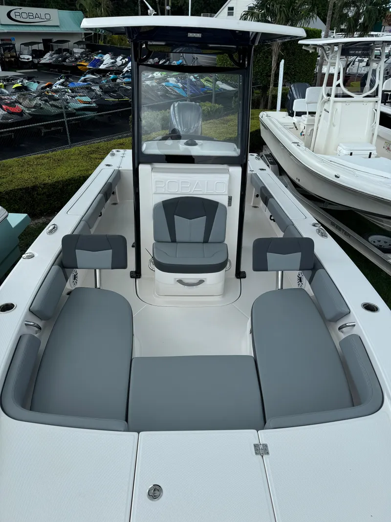 Slide: The Image of 2025 Robalo 246 Cayman boat with sleek seating and modern design. - 12