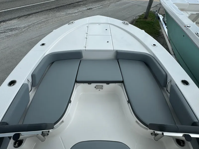 Slide: The Image of 2025 Robalo 246 Cayman boat with spacious seating and sleek design. - 9