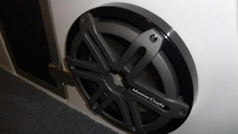 Slide: The Image of MasterCraft X23 2017 boat speaker with sleek design and branding. - 13