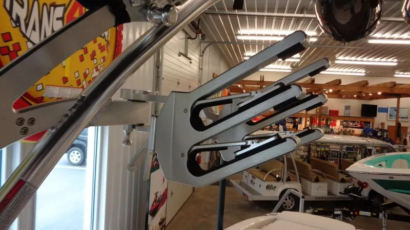 Slide: The Image of 2017 MasterCraft X23 wakeboard rack in a showroom setting. - 33