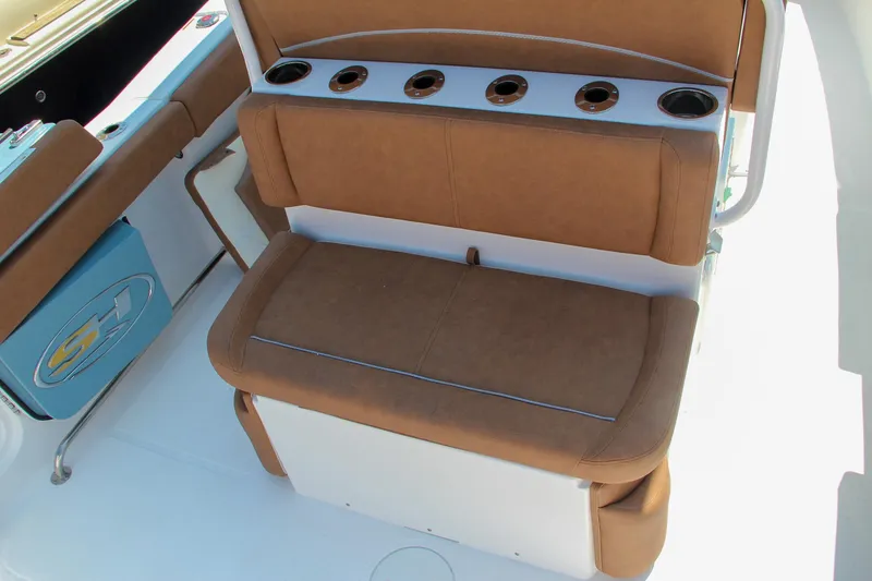 Slide: The Image of 2025 Sea Hunt Ultra 275 SE boat seating with cup holders. - 12