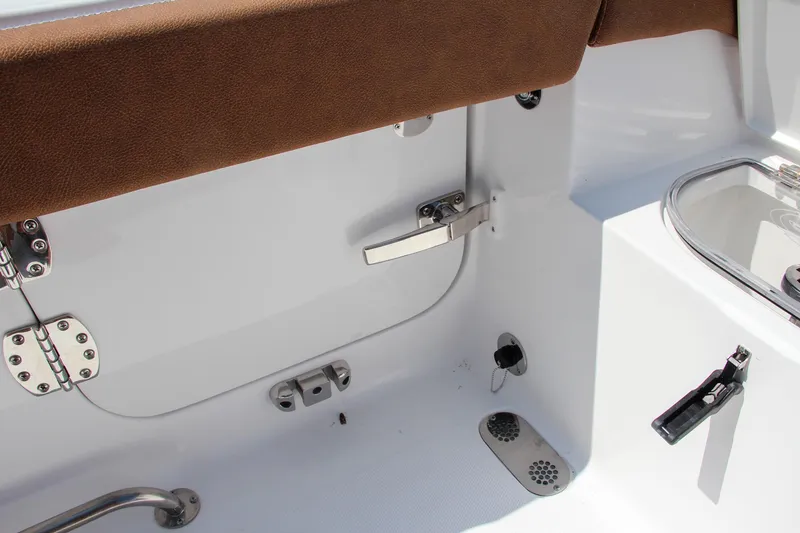 Slide: The Image of Interior view of 2025 Sea Hunt Ultra 275 SE boat, featuring seating and hardware details. - 21